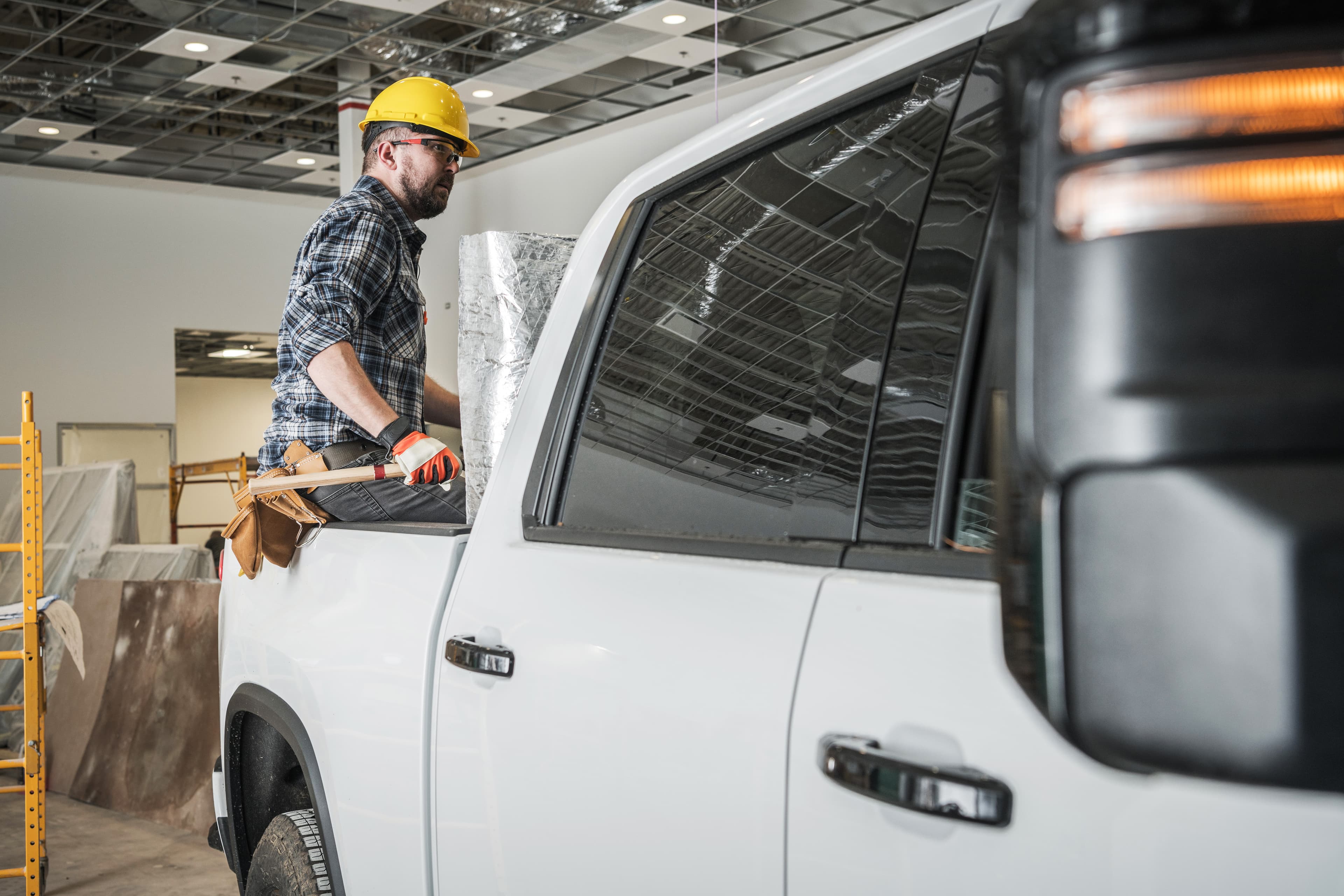 All Weather Roofing Systems crew with their work truck.